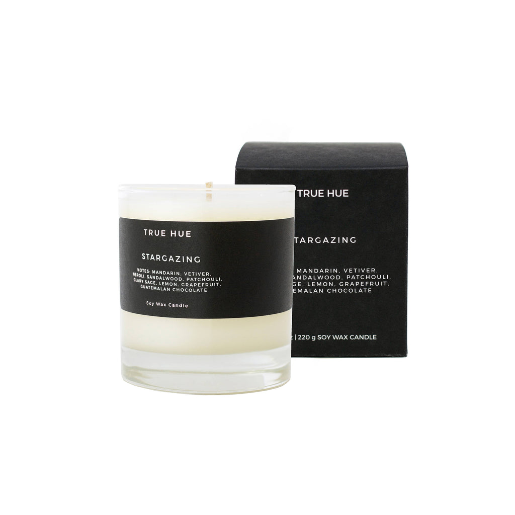 Tru Hue Stargazing Soy Wax Candle with notes of Mandarin & Vetiver. 7.75oz. Laying on the cool grass under meteor showers. Stars dash against the dark blue atmosphere. Mandarin, vetiver root, and sandalwood. Each candle comes complete with a premium cotton wick which burns cleanly for 40–50 hours.