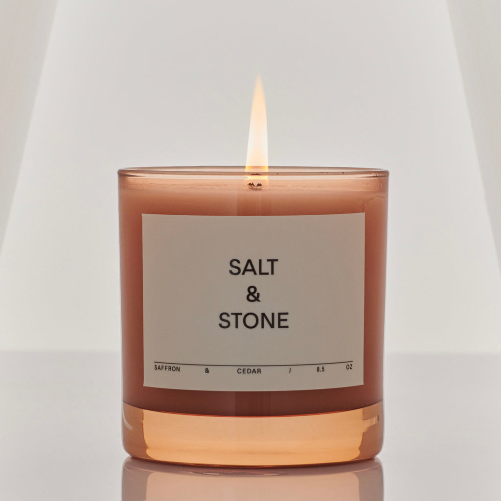 Salt & Stone Grapefruit Patchouli Candle in Canada with Coconut & Soy based wax. Fill your space with the aroma of dark, beachside forests. Clean and clear air, only nature filling the space with scent. A dynamic and bright aromatic blend of pink grapefruit, orange and black pepper enhanced by Vetiver and Patchouli. 