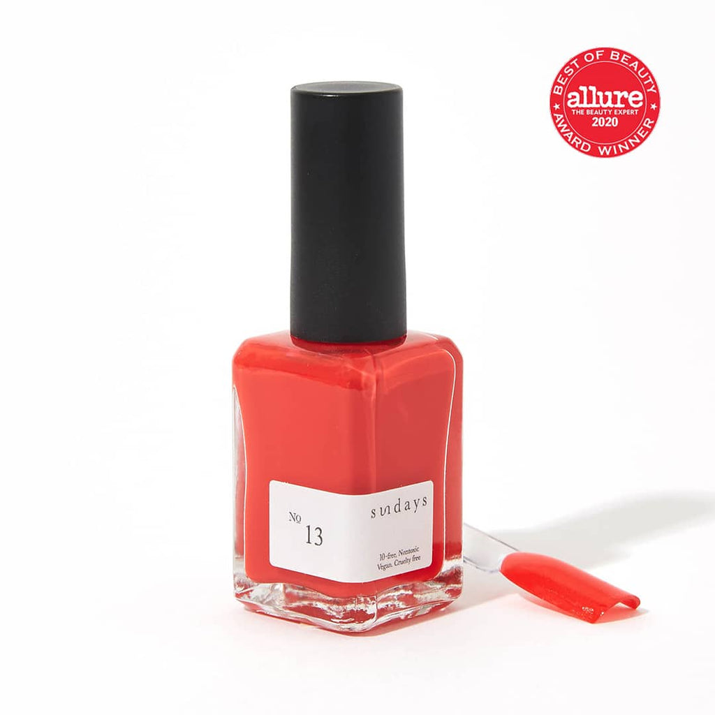 Sundays nail polish in Canada. Non-toxic, 10 free and vegan beauty. Beautiful variety of colours. Orange cherry tones and hues for your fingertips. A bright pop of red for summer.