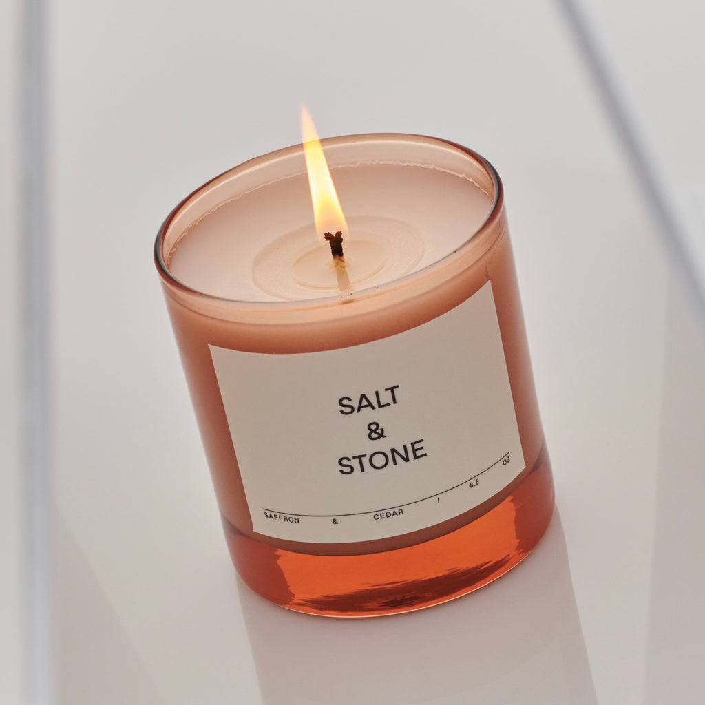 Salt & Stone Black Rose Vetiver Candle in Canada with Coconut Soy Wax. Capturing the essence of a Sunday morning with a cool ocean breeze coming through, Dylan record playing in the background. A bouquet of black roses opens with a rich but sophisticated blend of vetiver and sandalwood atop woody base notes of cedar.