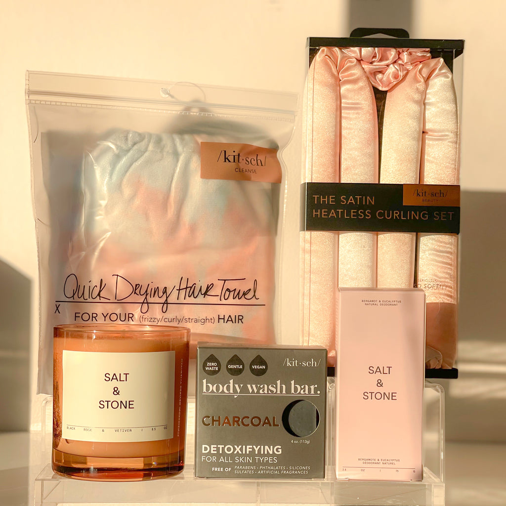 Shop our beauty gift basket which includes a Kitsch heatless curling rod, microfibre wrap towel for hair and a charcoal detoxifying bar as well as Salt & Stone's natural deodorant and soy candle. These luxurious accessories enhance the bathing and grooming experience with their beautiful scents and fabulous results.