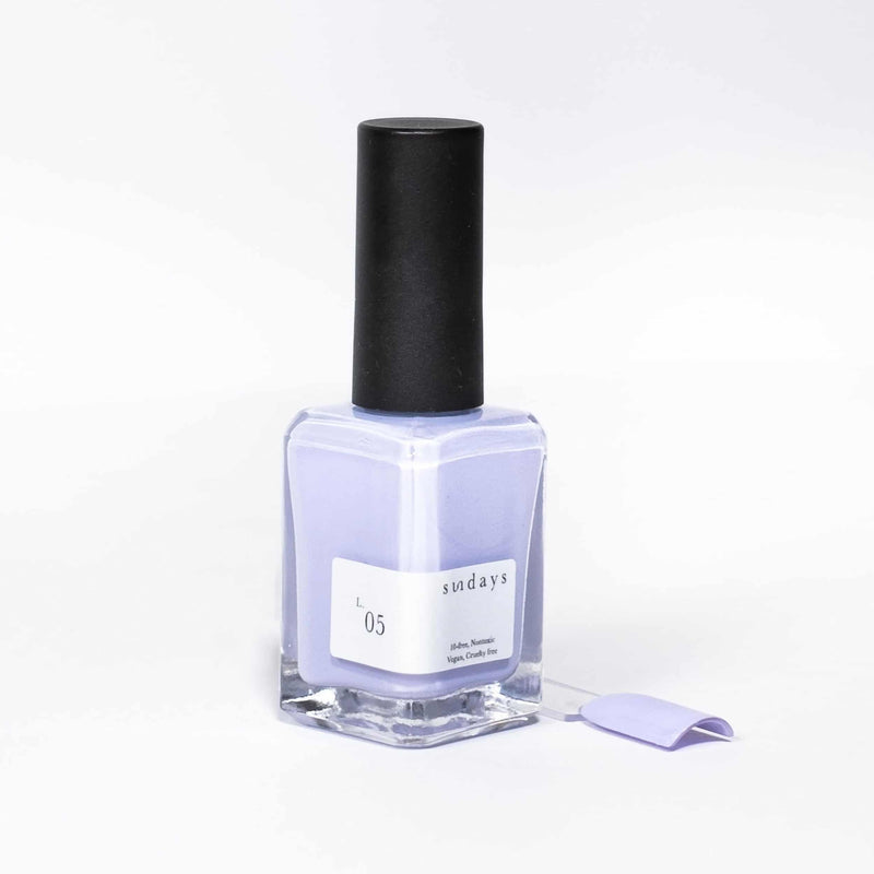 Shop Sundays Studio nail polish in Canada. A beautiful selection of colours from neutral hues to bright pops of colour. Polishes are vegan, cruelty free & non-toxic. This pastel creamy lavender is always a good choice as we transition between Spring to summer. You can dress it up for an elegant occasion or down for a relaxing summer Friday day in the park.