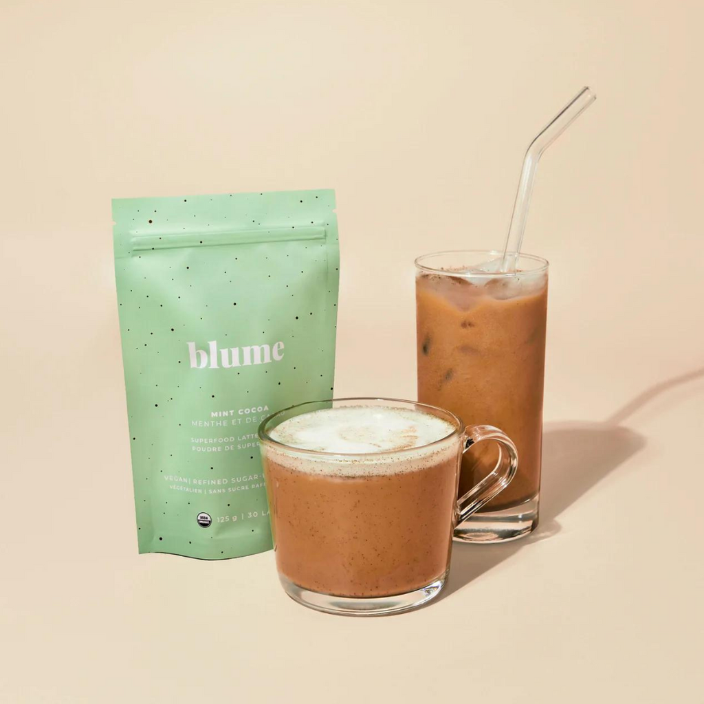 Blume Mint Cocoa Blend. Everyone’s holiday fave is a superfood! Powdered hot chocolate, formulated to soothe indigestion and support hormonal balance. Packed with peppermint, a natural pain reliever, this blend helps you ditch the headaches, digestion pain, and troublesome cramps during “that time of the month”. 