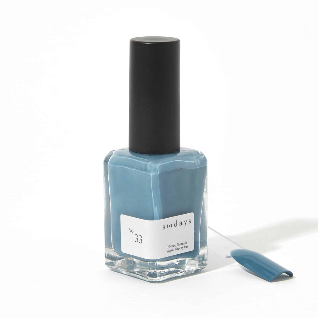Sundays nail polish in Canada. Non-toxic, 10 free and vegan beauty. Beautiful variety of colours. The perfect blue for your fingertips. Steel blue is the perfect colour to wear with denim in the fall or black in the winter or whenever you want to wear blue. It's a good one!