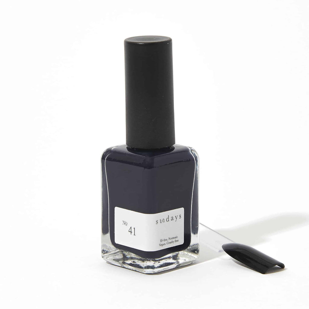Sundays nail polish in Canada. Non-toxic, 10 free and vegan beauty. Beautiful variety of colours. The beautiful deep blue midnight colour is perfect for your next pedicure or manicure. It's rich pigment goes on smooth and lasts for day without chipping of peeling. It's beautiful.