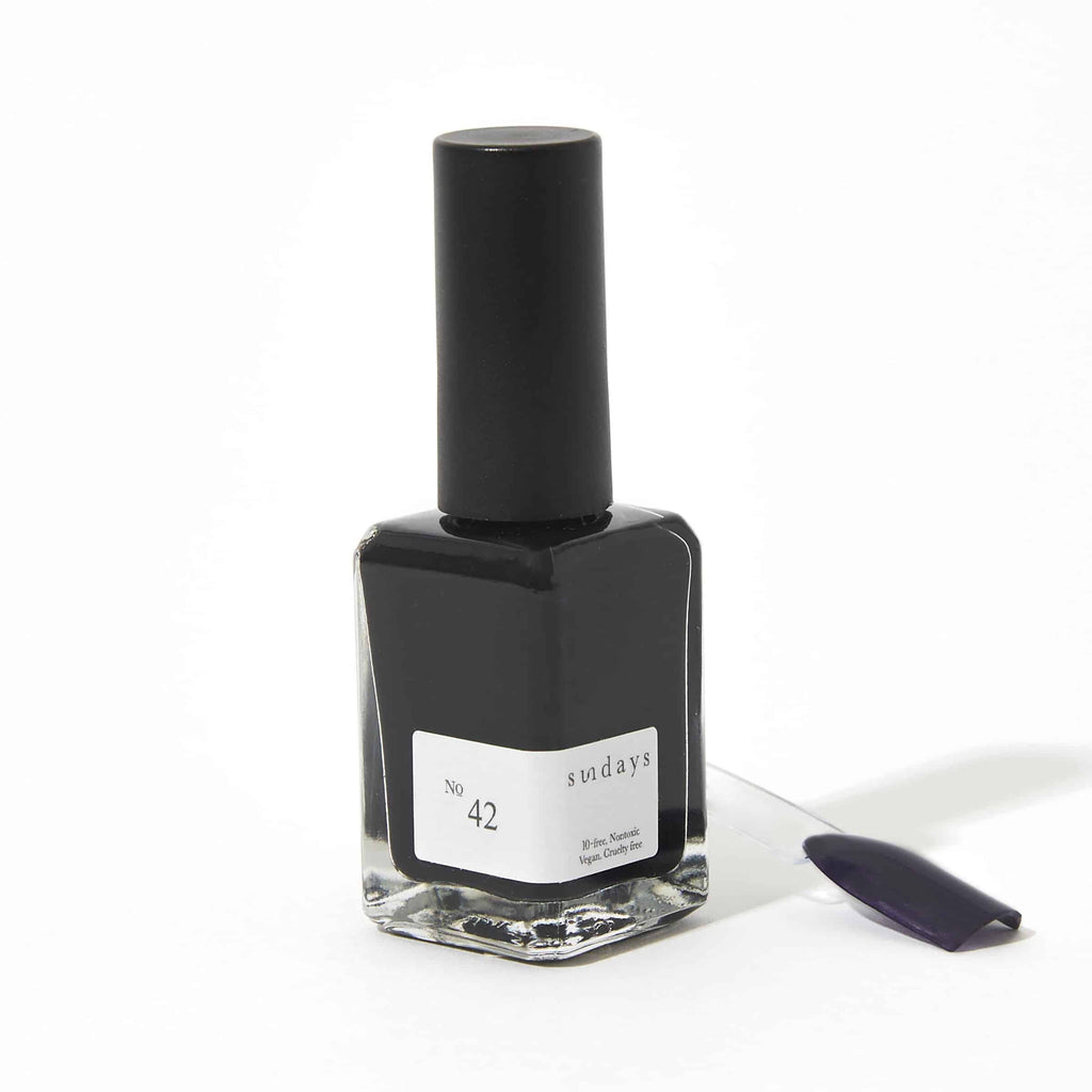 Sundays nail polish in Canada. Non-toxic, 10 free and vegan beauty. Beautiful variety of colours. This deep rich black polish is a beautiful rich pigment for your fingertips this winter.
