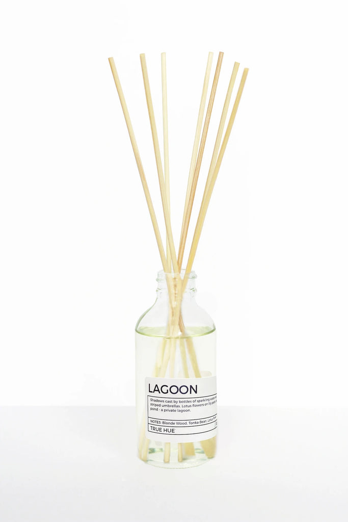Shop True Hue Lagoon Reed Diffuser in Canada. Shadows cast by bottles of sparkling water rest on Turkish towels tucked under yellow striped umbrellas. Lotus flowers on lily pads, oak moss under willows. A cool, blue pond - a private lagoon. Our 4 oz, alcohol-free, phthalate-free and environmentally friendly formula is an easy and long-lasting alternative to fill your space with fragrance. Our scents come from essential oil based fragrance oils.